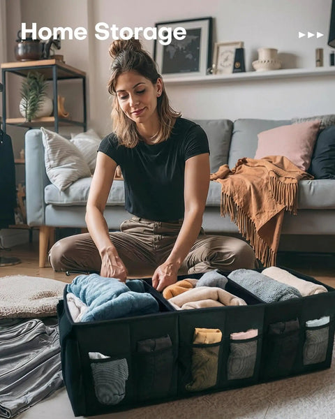 Woman organizing clothes in a black foldable car trunk organizer with three compartments and six mesh pockets, suitable for SUVs and sedans.