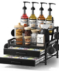 4 Tier Coffee Syrup Rack Organizer With Room For 8 Syrup Bottles And 84 Coffee Pods Perfect Countertop Bar Station For Your Coffee Setup Kitchen Storage Black, showing neatly arranged syrup bottles, coffee pods, and accessories on black metal frame.