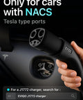 Plug And Play Level 2 EV Charger With Dope NACS Connector To Crank Your Battery Fast On Any 240 Volt Nema 14-50 Socket Smooth Operator For Tesla Or Every Street Whip Cruising Downtown close-up of NACS connector hand-held