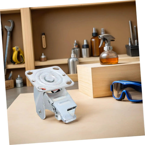 Rugged Steel Swivel Caster Bracket With Locking Brake And Four Inch Wheels on workbench with tools in background.