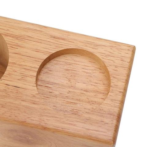 Sweet Beech Wood Coffee Tamper Stand With Clever Side Nook Securely Stores 51 To 58 Mm Tools close-up view of circular indentations.