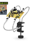 Four Arm Third Hand Soldering Station with Gooseneck Arms and Tip Clamps Holding PCB on Workbench