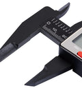 Close-up view of 6 Inch Digital Caliper With Large LCD Display And Wide Readout Pro Grade Precision, measuring jaw and metric scale visible.