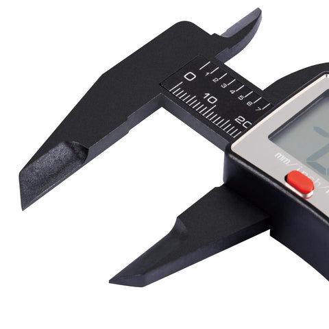 Close-up view of 6 Inch Digital Caliper With Large LCD Display And Wide Readout Pro Grade Precision, measuring jaw and metric scale visible.