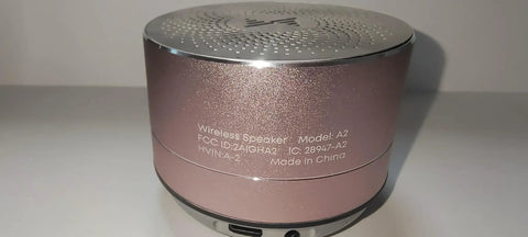 Rose gold Tiny But Mighty Grab And Go Metal Bluetooth Speaker With Lights And Lanyard 5W Mini Wireless 5.0, close-up view.