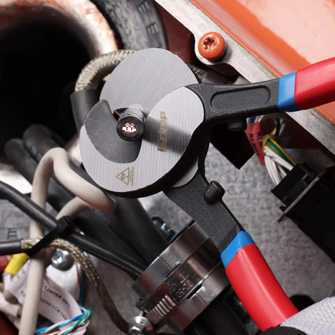 Pro Grade Heavy Duty Cable Cutter And 9 Inch Wire Snips cutting copper wire in tight electrical space with high density steel blades.