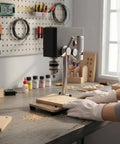 Fonowx Compact Miniature Bench Drill Press With Space Saving Tabletop Design And Accurate Chuck Support For Hobbyists And Garage Workshops Ensuring Enhanced Workpiece Stability And Practical Setup on workbench.