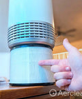 Person pointing to Triple Filtration Air Purifier Replacement Filter Set With Pre Filter True HEPA And Activated Charcoal for cleaner air