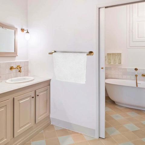Gold Brushed 7 Piece Bathroom Accessory Kit Wall Mounted Featuring 23.62 Inch Double Towel Bar in a modern bath setting