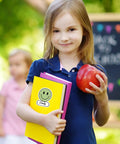 Child holding books with Smiley Name Tags Pack 120 Pcs Boho Pastel Smile Face Nameplates for Classroom, apple in hand.