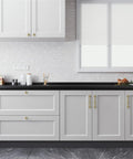 Solid Brass Cabinet Pull And Drawer Knob With Modern Grooved Base Design In Antique Brass Gold And Chrome Finishes on white cabinets