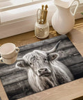 Absorbent Coffee Machine Mat for Kitchen Countertop 11.8 by 17.7 Inches with cow design on wood surface