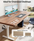 Huanuo Electric Standing Desk Frame With Powerful Brushless Motor For Dual Monitor Riser shown with dual monitors on 74.8" x 35.4" tabletop.