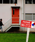 Propane Safety Sign Set No Smoking No Open Flames Aluminum Warning Signs With NFPA Symbol outside industrial building