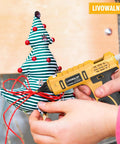 Cordless Hot Glue Gun That Works With Dewalt 20V Batteries 100W Tool used on Christmas decoration, no wires visible, 30 glue sticks included