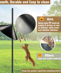 Heavy Duty Squirrel Proof Bird Feeder Baffle 19 Inch Diameter Pole Mount Shield For Outdoor Use Keeps Squirrels Off And Protects Your Feeder On A Shepherds Hook, shown in use with a squirrel attempting access.