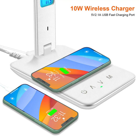 Desk Lamp With Wireless Charger And USB Port, Dimmable LED Table Light With Clock, showing charging phones on a white base.