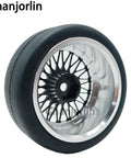 Close-up of RC Drift Tires with aluminum wheels, 2.56 Inch OD, showcasing hex pattern and rubber surface for rally cars, assembly required.