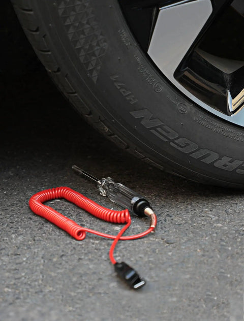 Beefy Heavy Duty 6 To 24V Automotive Circuit Tester With Replacement Indicator Light And Extra Spring Bulb For 6V 12V And 24V DC Circuits In Cars Trucks And More, next to car tire