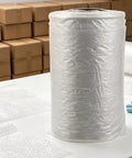 Inflatable Bubble Cushioning Roll For Shipping And Moving 984 Ft 300 M Pro Grade Lightweight Protection on packing table