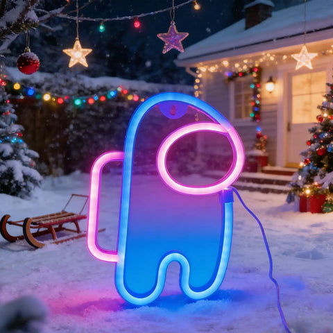 Lit Alien Neon Sign Light Astronaut LED Decor glowing outside snow-covered house with Christmas lights