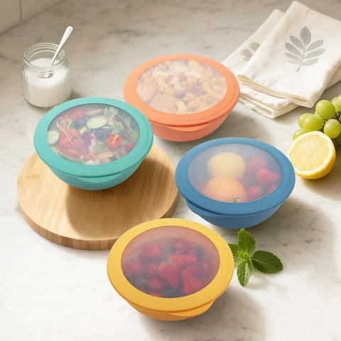 Four Wheat Straw Bowls Set With Lids, 40 Oz Unbreakable Cereal Bowls, 4 Piece Lunch Containers, arranged on a kitchen counter