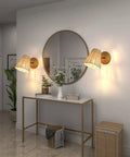 Black Metal Wall Sconce Light With Pull Chain 1 Light Farmhouse Industrial Lamp in a hallway with a mirror and console table.