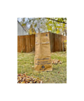 30 Gallon Lawn And Leaf 2 Ply Heavy Duty Yard Waste Paper Bags Self Standing Design outdoors on grass with autumn leaves