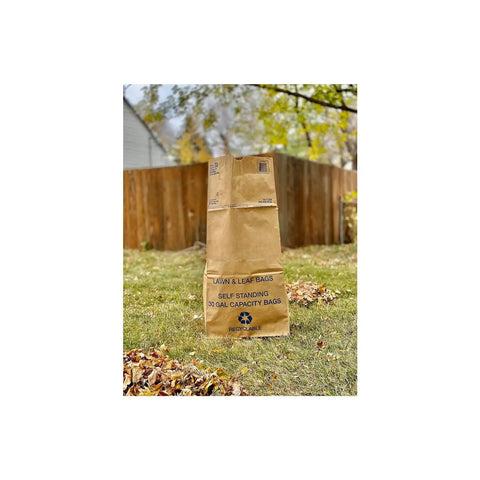 30 Gallon Lawn And Leaf 2 Ply Heavy Duty Yard Waste Paper Bags Self Standing Design outdoors on grass with autumn leaves