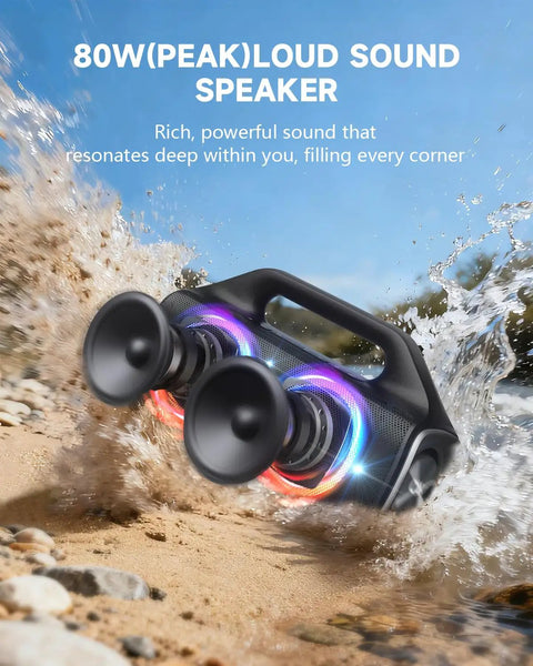 IPX67 Waterproof Bluetooth Speaker With 80W Peak Power Deep Bass And LED Lights splashed by water on a beach