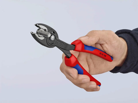 Hand holding TwinGrip Adjustable Front Grip Pliers With Side Grip Push Button Adjust Tongue And Groove Joint Black With Multi Component Sleeves 200mm