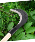 Heavy Duty Weeding Blade Hand Hoe For Gardening With Long Handle Manganese Steel Scythe in lush greenery