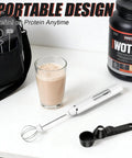 4 In 1 Protein Powder Mixer Wand With Scoop Funnel Set Waterproof Detachable Rechargeable For Coffee Matcha Milk And Other Drinks shown with protein shake on counter