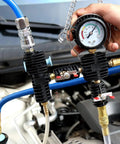 Hella Tough Coolant Vacuum Refill Kit For Rigs And Rides Heavy Duty Radiator with gauge and blue hoses in engine bay.