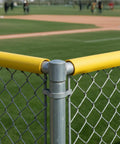 Premium Fence Topper 50 Ft Yellow Chain Link Fence Cover installed on baseball field for safety and visibility