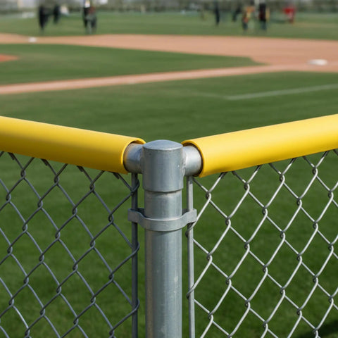 Premium Fence Topper 50 Ft Yellow Chain Link Fence Cover installed on baseball field for safety and visibility