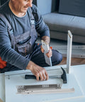Man installing Heavy Duty Drawer Slides 2 Pack With Thick Cold Rolled Steel Rails, No Squeak Damping Buffer, High Load Bearing For Cabinets And Dressers, Easy Install, Smooth Quiet Sliding For Kitchen Cabinets And Home Furniture on a drawer panel