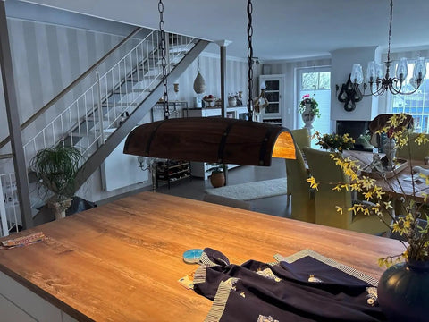 Rustic Resin Wine Barrel Pendant Lamp With Tree Grain Pattern illuminating a cozy farmhouse kitchen area, E26 socket.
