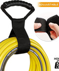 Versatile 17 Inch Adjustable Black Nylon Storage Strap With Ergonomic Handle For Cords Garden Hoses Swimming Gear And Garage Tools Heavy Duty Organizer With Strong Velcro For Reusable Easy Grab And Go Neat Storage holding yellow hose