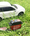 DS3225MG Digital Servo Beefy High Torque Full Metal Gear Waterproof For RC Cars And Crawlers With 270 Degree Control shown on grass