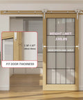Stainless Steel Sliding Barn Door Hardware Kit With 7Ft Rail Installed on Wooden Door, Showing Weight Limit and Fit Door Thickness