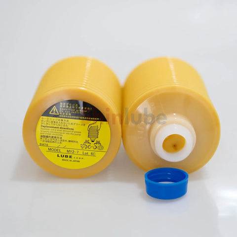 MY2-7 Cartridge Grease 700cc for Sumitomo Injection Molding Machines, yellow cartridge with blue cap, label visible