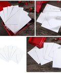 Bulk White B6 Card Envelopes 50 Pack Self Sealing 15.7 X 10.6 Cm displayed in a red box on a wooden surface