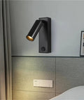 Modern Rotatable Cylinder Wall Sconce Wall Mount Reading Spotlight with flexible rotation, sleek black finish, perfect for bedside use.