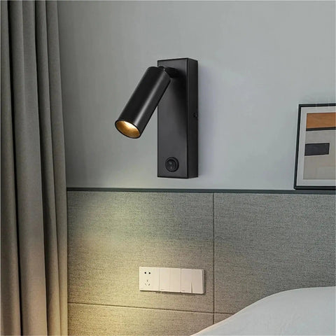 Modern Rotatable Cylinder Wall Sconce Wall Mount Reading Spotlight with flexible rotation, sleek black finish, perfect for bedside use.
