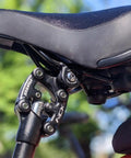 SP12 NCX Suspension Seatpost Parallelogram Design with shock absorption, visible on hardtail bike for smooth rides