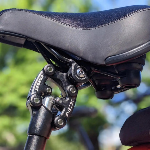 SP12 NCX Suspension Seatpost Parallelogram Design with shock absorption, visible on hardtail bike for smooth rides