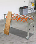 Heavy Duty Adjustable Conveyor Roller Table With Universal Wheels For Moving Wood And Construction Materials Up To 110lbs Loading Capacity and solid iron build.