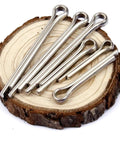 Assorted Stainless Steel Cotter Pin Kit With Hairpin Pins And Springs For Auto Hardware And Truck Repair Gear on wooden base