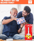 Two people sitting on a sofa sharing a gift, packaging for a high pressure grease coupler with bow visible nearby.